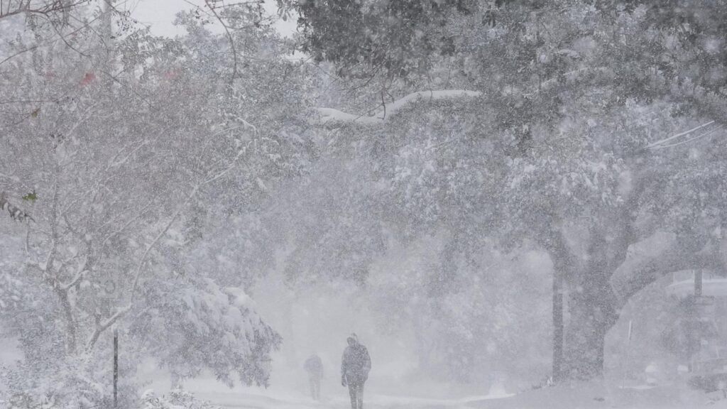 Winter storm that dropped record-breaking snow in New Orleans spreads into Florida and the Carolinas