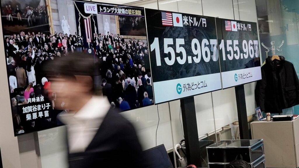 Stock market today: Global shares trade mixed in a muted reaction to the U.S. inauguration